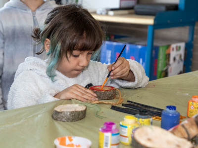 Earth Day visitor making a craft