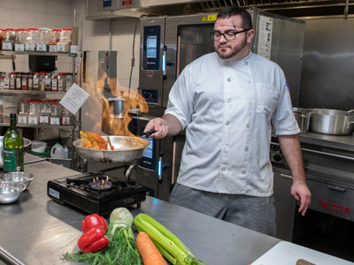 Culinary Student preparing a dish