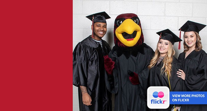 Recent graduates celebrate with Rudy