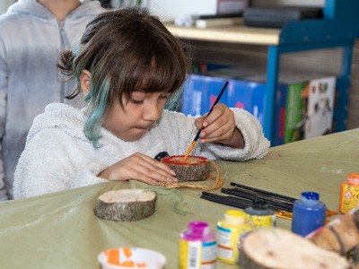 Earth Day visitor making a craft