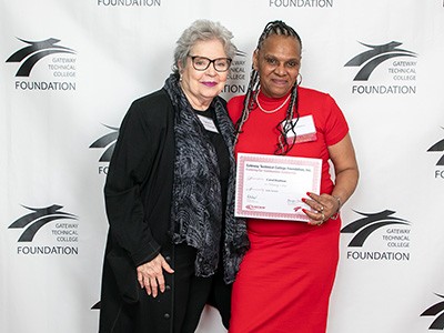 Student receiving scholarship award