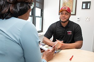 Student speaking with an advisor